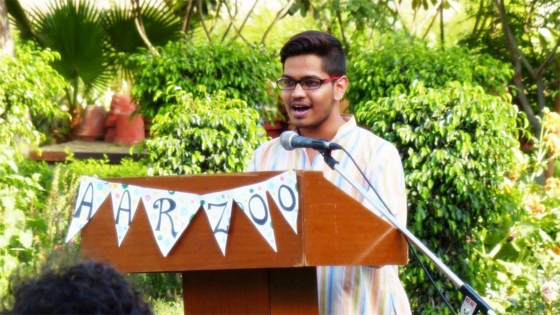 Satvik speaking at an Aarzoo community event