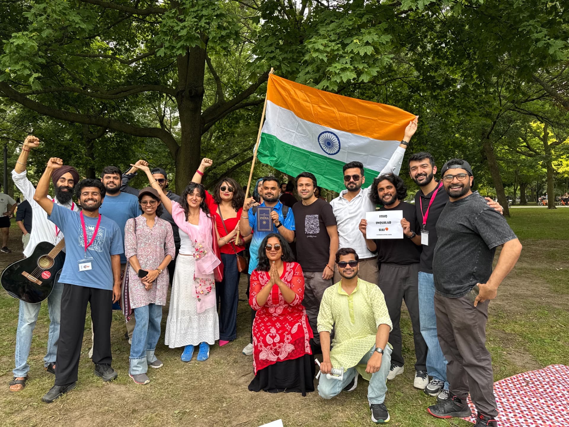 Group gathering with the Indian flag at a solidarity event in Toronto