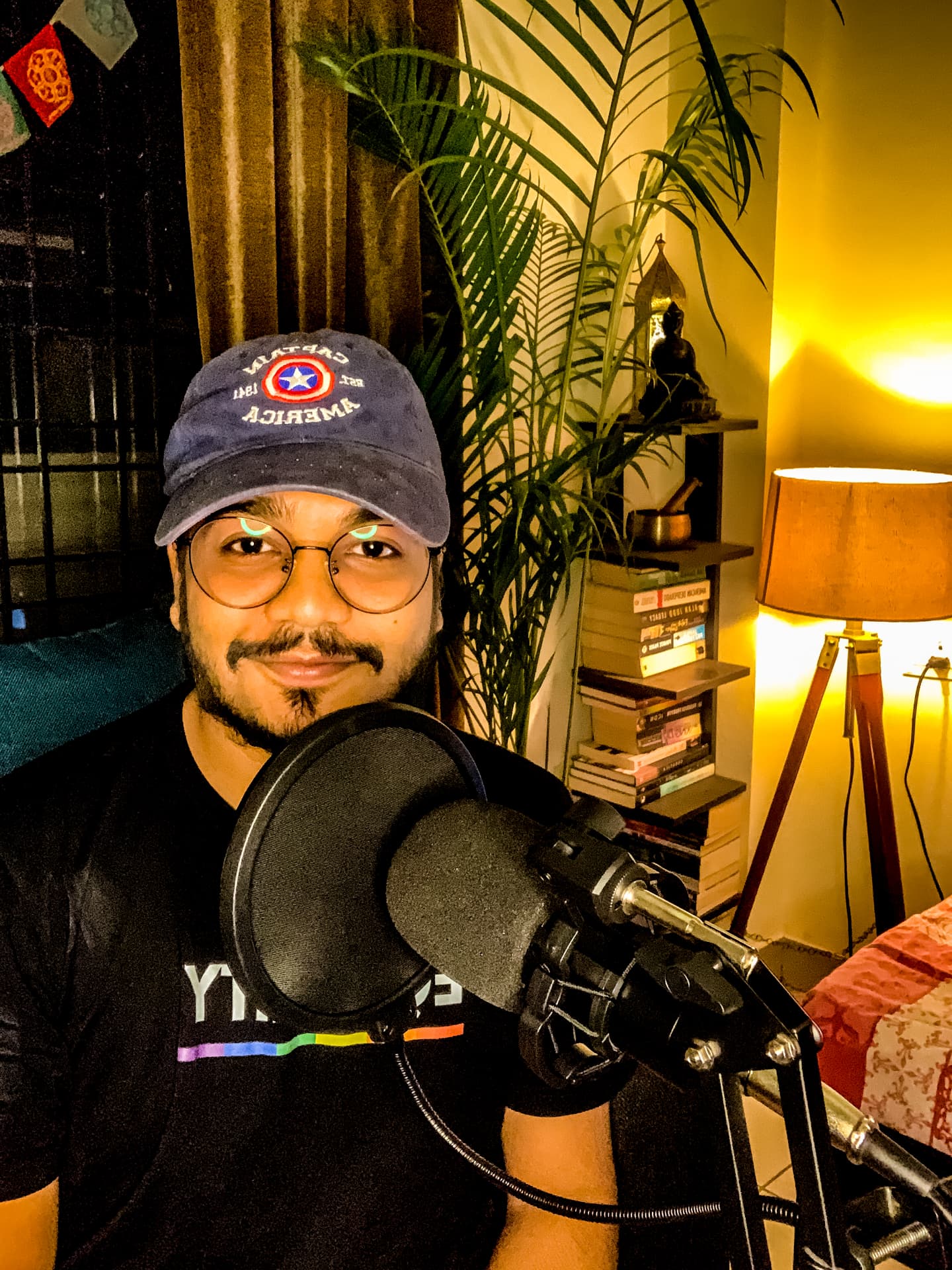 Satvik at a microphone during a recording session