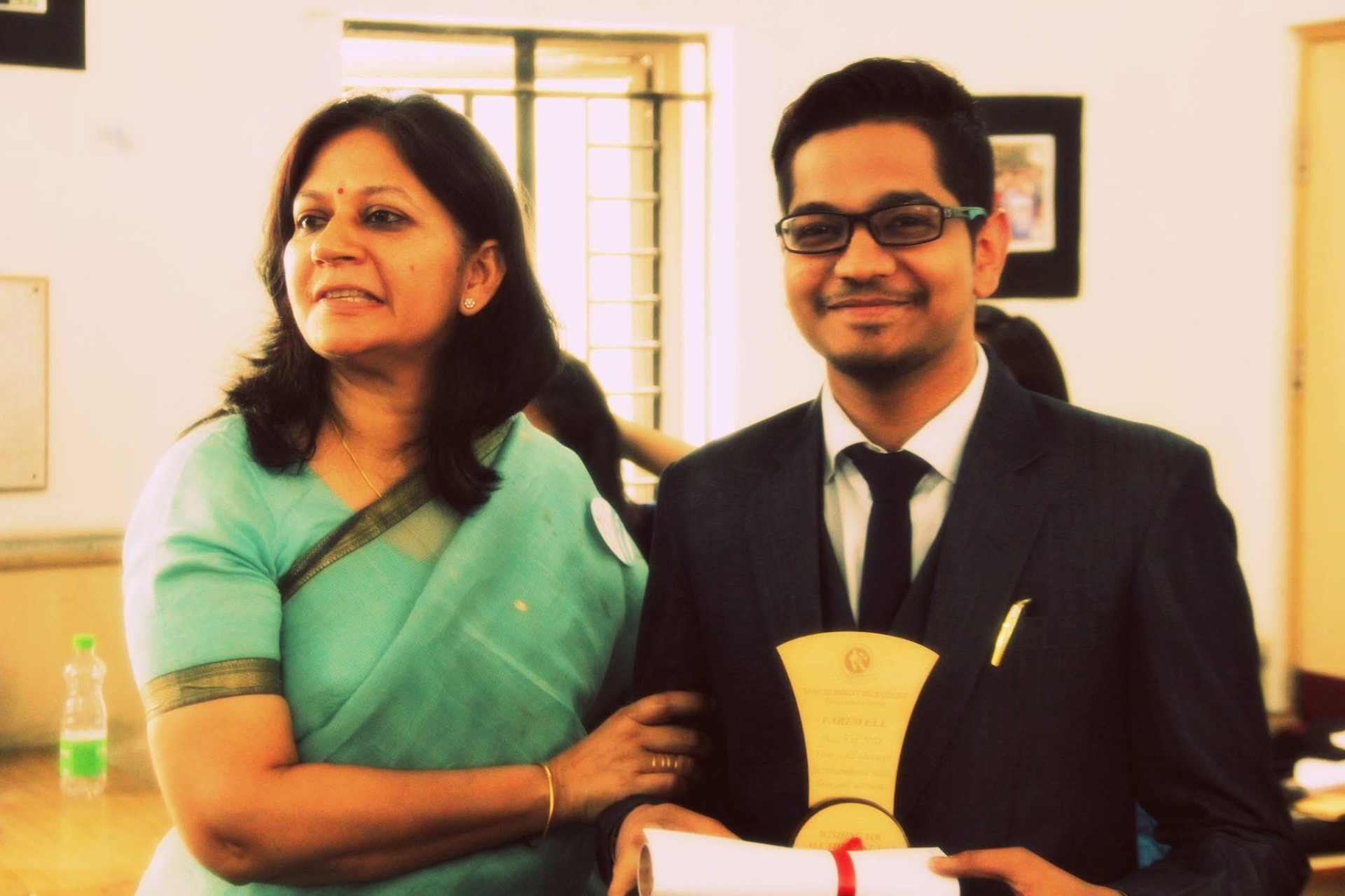 Satvik with a professor during his university years
